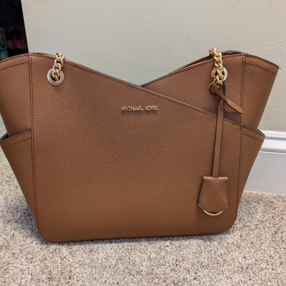 Michael Kors Brown Shoulder Bag with Adjustable Straps and Silver Hardware